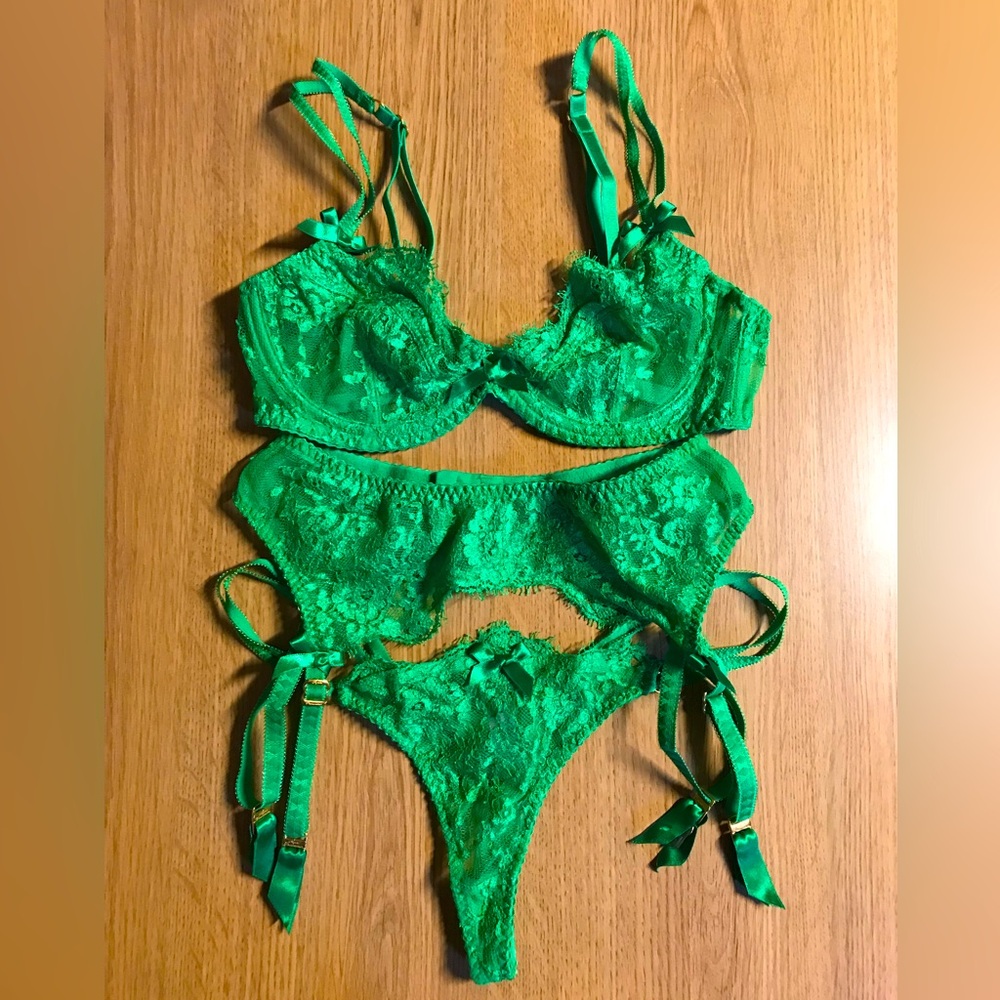 Agent provocateur green lace 3 piece set. Bra, garter, and thong.
